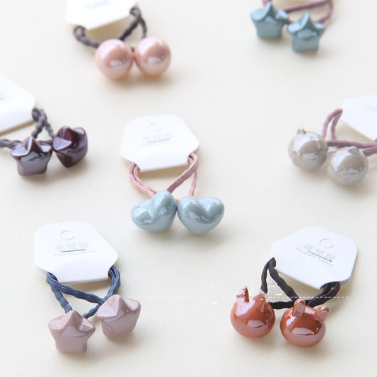 Accesorios para el Cabello Infantil con Cuentas de Colores Sólidos y Gomas Elásticas - Image 2