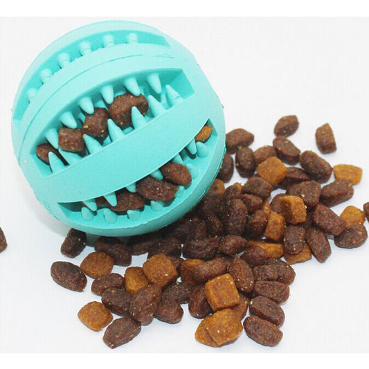 Bright green rubber pet toy ball with textured spikes and ridges for dental cleaning and food dispensing. - Image 2