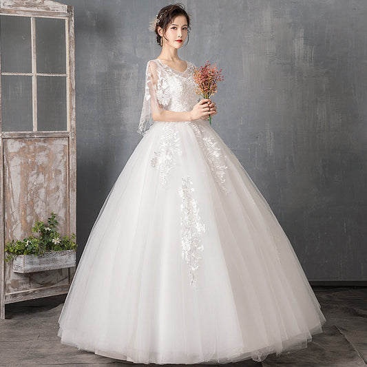 Vestido de Novia con Mangas Largas y Cola Elegante - Image 2
