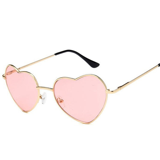 Gold frame heart-shaped sunglasses with transparent yellow lenses and black earpiece tips. - Image 2