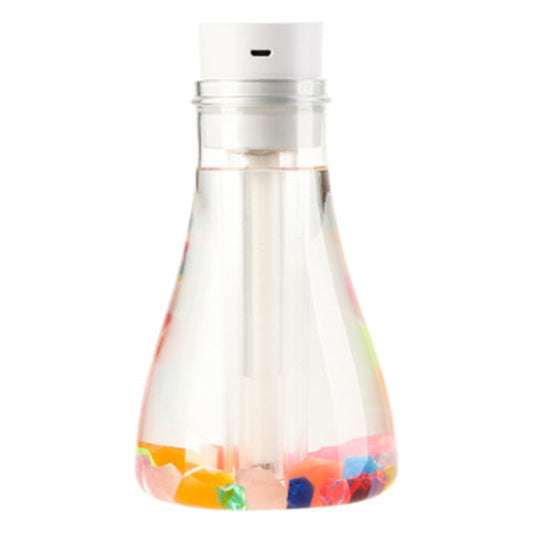 Wishing bottle humidifier with a clear body, white top, and colorful decorative stones at the bottom. - Image 2