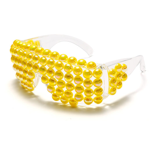 Clear shield sunglasses with multiple rows of colorful, iridescent round beads covering the front, on a white background. - Image 2