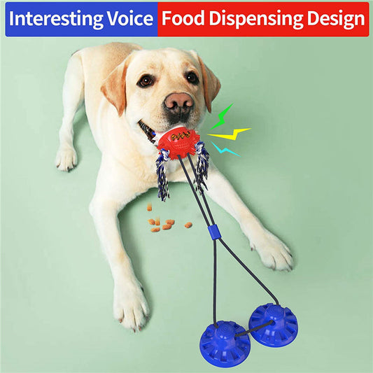 Yellow Labrador Retriever playing with a red and blue suction cup dog toy that dispenses food. - Image 2