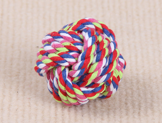 Three colorful knotted cotton rope ball dog toys in various sizes on a light beige surface. - Image 2