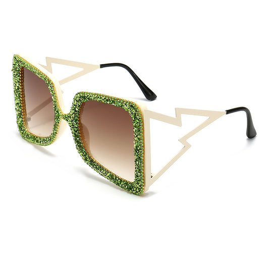 Women's oversized square sunglasses with cream frames, green rhinestones, brown gradient lenses, and lightning bolt temples. - Image 2