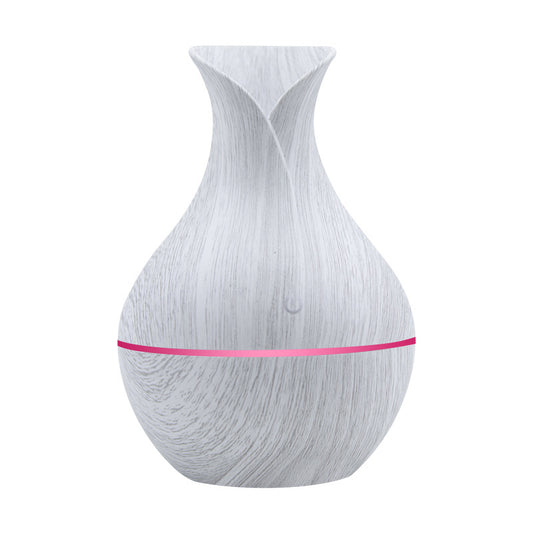 White wood grain household humidifier with a vase-like shape and a pink LED light band. - Image 2