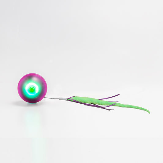 Electric cat toy with a glowing purple and green ball, attached to a fuzzy green tail with purple ribbons. - Image 2