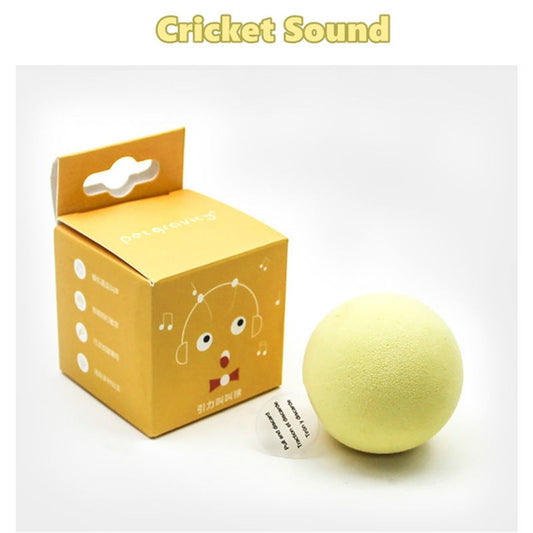 Light yellow interactive cat toy ball with a cricket sound feature, shown next to its yellow packaging. - Image 3