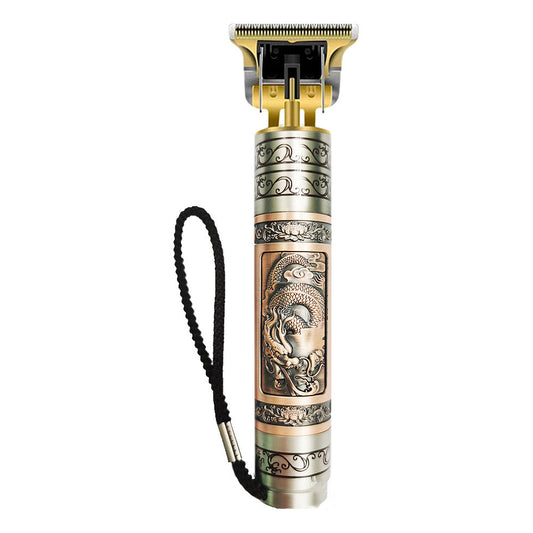 Professional electric hair clipper with gold T-blade, bronze and silver decorative handle, and black wrist strap. - Image 2