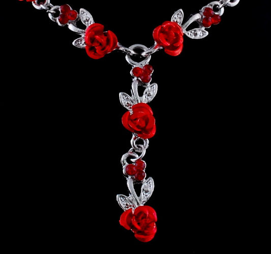 Red rose alloy necklace and stud earrings set with silver-tone chain and clear accents, displayed on a black bust. - Image 2