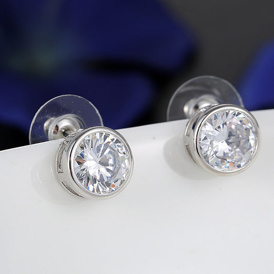 Silver-tone necklace and stud earrings set with round, bezel-set clear gemstones, ideal for bridal or formal wear. - Image 2