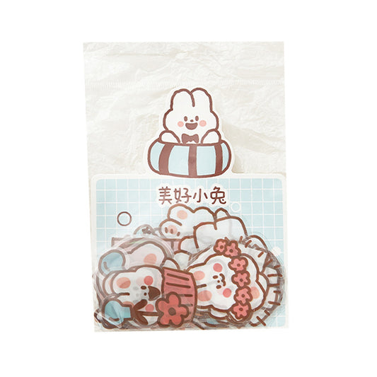 40-piece pack of cute white bunny PET stickers with pink outlines, showing the bunny in various activities like driving, fishing, and holding flowers, on a pink - Image 2