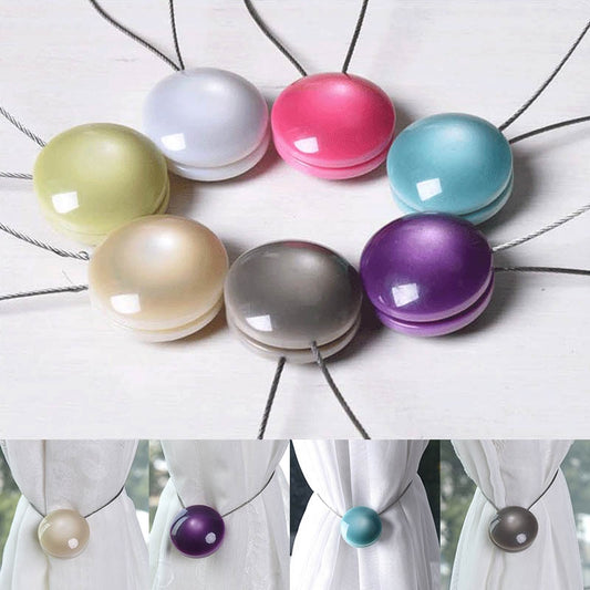 Purple magnetic curtain tieback with a round buckle and a thin silver wire loop on a white background. - Image 2