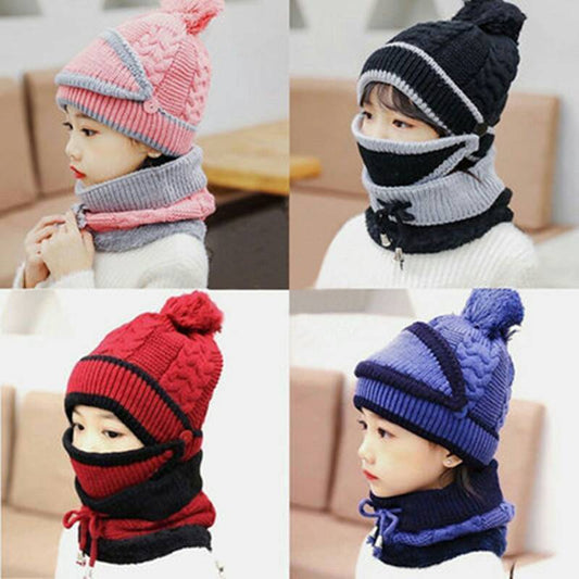 Young child wearing a pink and grey knitted hat with a pom-pom and a matching neck warmer with a drawstring. - Image 2