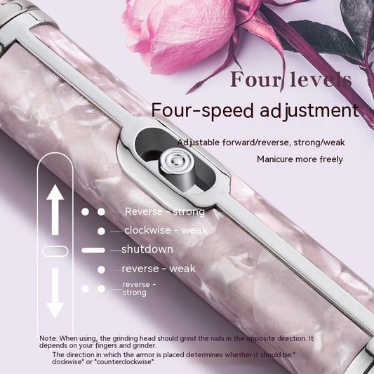 Silver-gray portable nail polishing instrument with a sleek, pen-like design and textured body. - Image 2