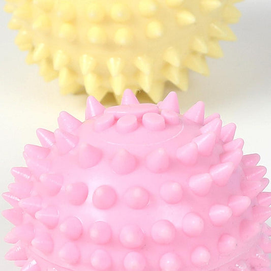 Yellow spiky pet toy ball with a paw print design, made from TPR for interactive play and molars. - Image 2