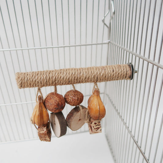 Hemp rope braided bird perch with natural wood slices and seed pods hanging, attached inside a wire bird cage. - Image 2