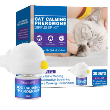 Cat Calming Pheromone Diffuser Kit with a white plug-in diffuser and a green refill bottle, next to its green and white box. - Image 2
