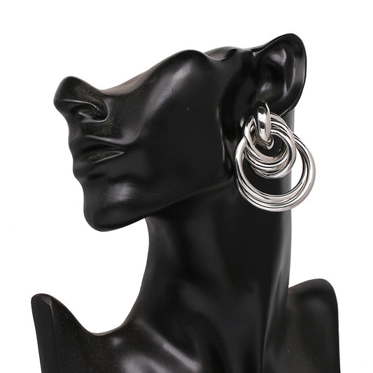 Aretes redondos de perlas metálicas - Image 2
