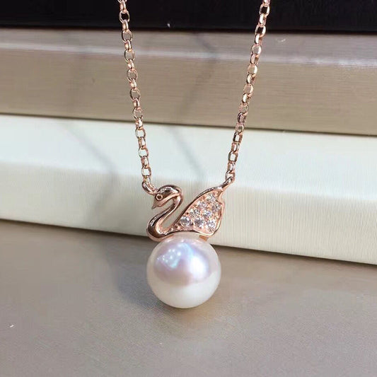 Aretes de Plata S925 con Perla de Agua Dulce Diseño Cisne - Image 2
