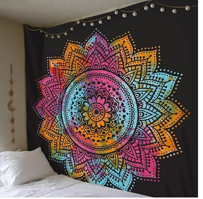 Vibrant multi-color mandala tapestry with a black background, hanging above a bed with white bedding. - Image 2
