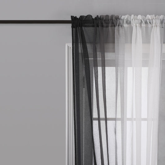 Pink and white gradient sheer rod pocket curtain panels hung on a black rod in front of a window. - Image 2