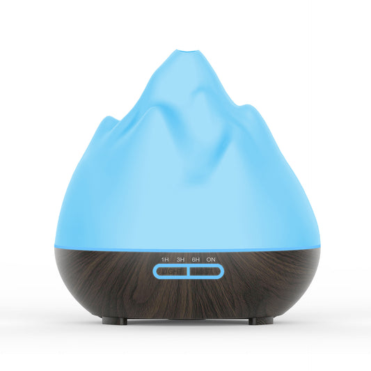 Mountain View Volcano Aroma Diffuser Mini Humidifier with blue LED light and dark wood grain base. - Image 2