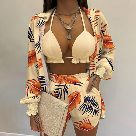 Women's three-piece beachwear set with neon yellow bikini top, floral print long-sleeve shirt, and matching shorts. - Image 2