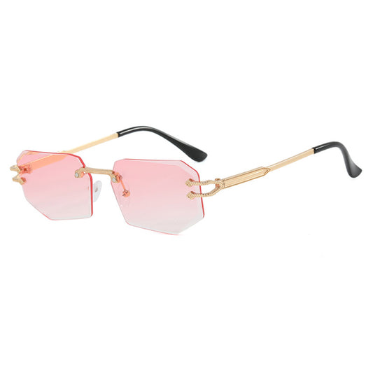 Rimless octagonal clear lens glasses with silver-toned metal temples and black ear tips, featuring decorative accents. - Image 2