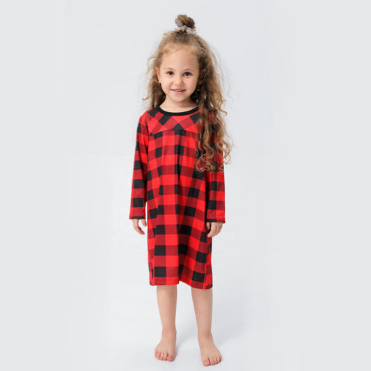 Baby in a red and black buffalo plaid long-sleeve pajama romper, viewed from the back with arms raised. - Image 2