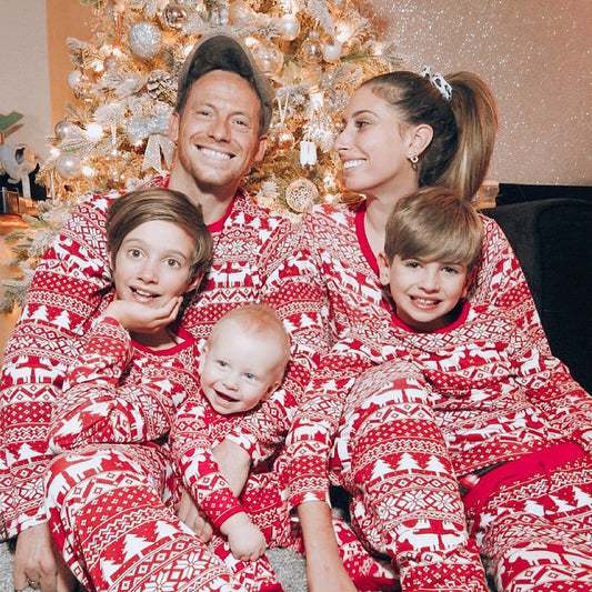 Red and white Christmas print one-piece pajama suit with moose, snowflake, and Christmas tree patterns. - Image 2