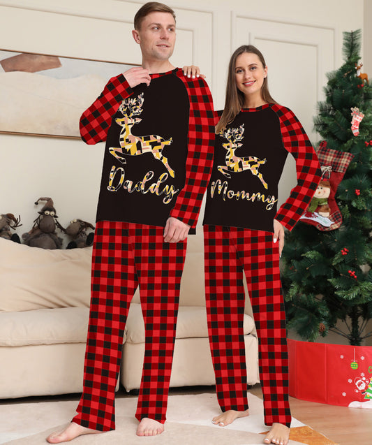Kids' black and red buffalo plaid pajamas with a colorful deer graphic and "Kids" text on the top. - Image 2