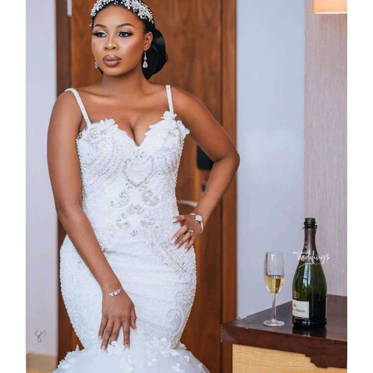 Vestido de Novia Africano con Encaje y Cola Voluminosa - Image 2