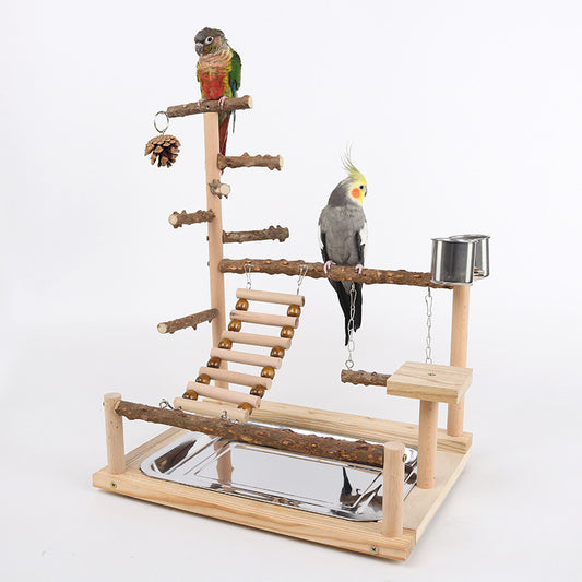 Multi-level natural wood parrot play stand with perches, ladder, swings, and two stainless steel feeding cups. - Image 2