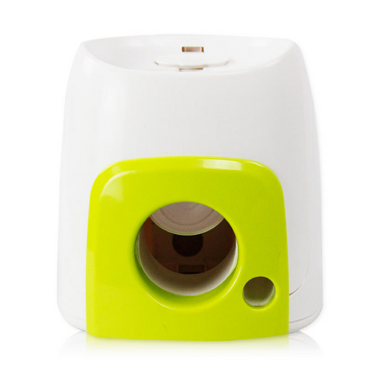 AFP Fetch'N Treat interactive dog toy, a white and green machine that dispenses treats with a tennis ball. - Image 2