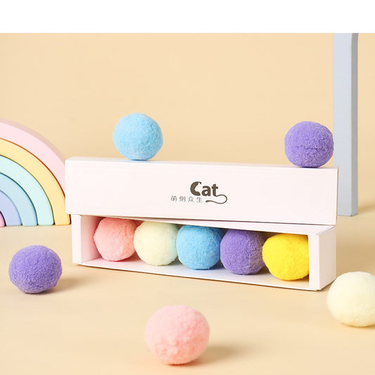 Five colorful plush balls in a white gift box, including pink, yellow, blue, purple, and bright yellow. - Image 2