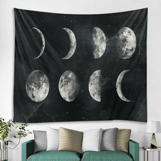 Black tapestry featuring a white and grey moon phase design, depicting the lunar cycle, hanging on a white wall. - Image 2