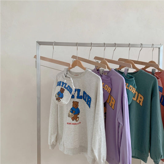 Large dog wearing a teal fleece-lined sweatshirt with 'BAYLOR' text and a bear graphic on the back. - Image 2