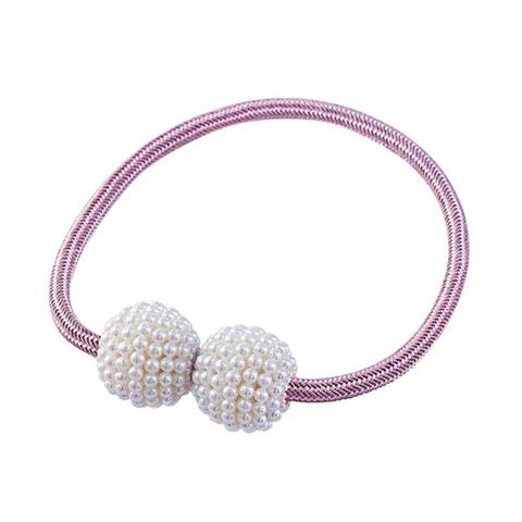 Magenta elastic curtain tieback with two white pearl-beaded spheres, designed to hold curtains elegantly. - Image 2