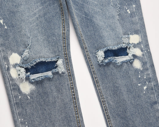 Jeans Azul Claro con Efecto Salpicado y Rotos Desgastados - Image 2