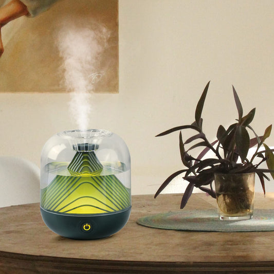 Red USB rechargeable humidifier with a clear dome top and a unique mountain-shaped interior design. - Image 2