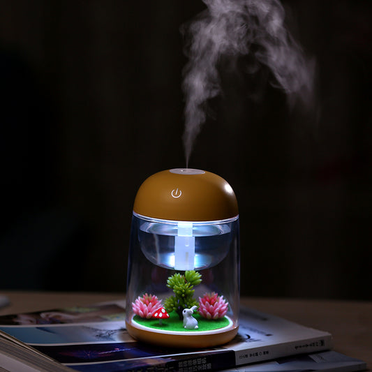 Pink and clear columnar humidifier with a micro landscape inside, featuring a white rabbit, red mushroom, and artificial plants. - Image 2