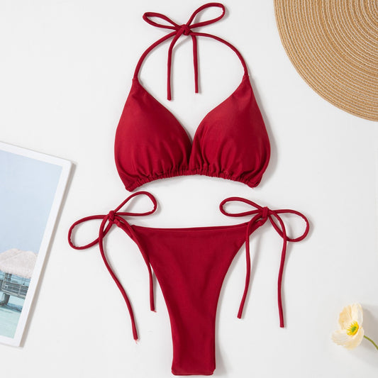 Red solid color two-piece bikini swimsuit with a halter tie-top and adjustable tie-side thong bottom. - Image 2