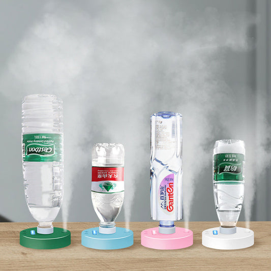 White round portable USB humidifier with a night light, single fog outlet, and two control buttons. - Image 2
