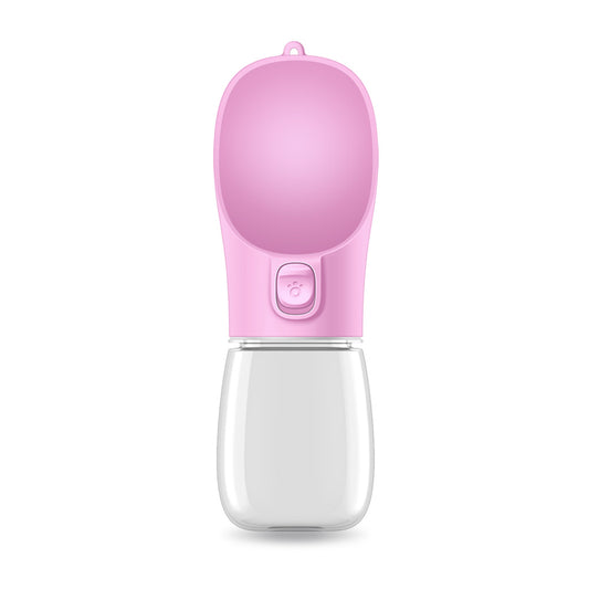 Pink portable pet drinking cup with a clear water reservoir and a paw print button for dispensing water. - Image 2