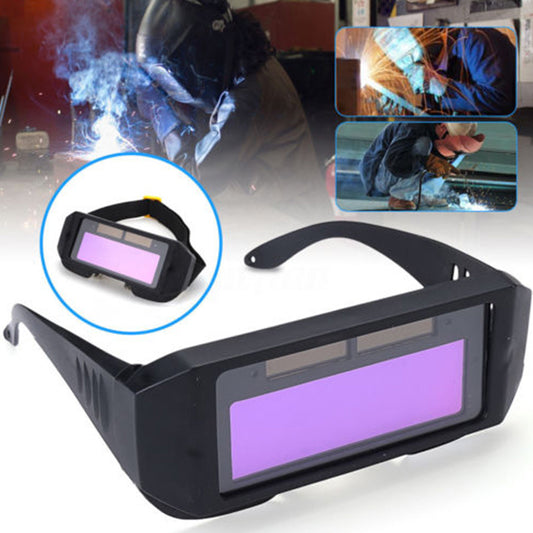 Black automatic dimming welding glasses with a purple auto-darkening lens and an adjustable elastic strap. - Image 2