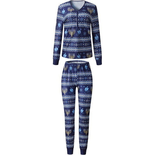 Family of five wearing matching navy blue Hanukkah pajamas with gold menorahs, blue dreidels, and white snowflakes. - Image 2