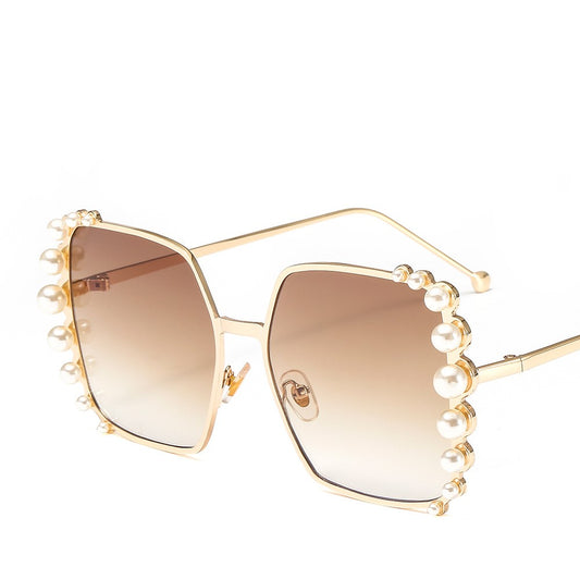 Oversized hexagonal sunglasses with gold-tone metallic frames, light pink lenses, and faux pearl embellishments. - Image 2