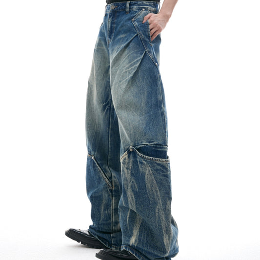 Jeans Vintage Azul Desteñido con Patrón Geométrico y Corte Curvo - Image 2