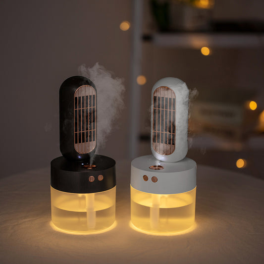Small white and rose gold humidifier fan with an oval fan unit and a translucent cylindrical water tank. - Image 2